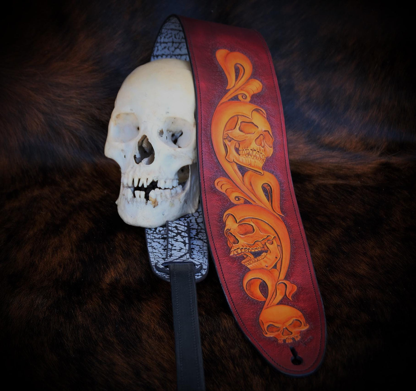 Hand-Carved Skulls and Vines Hermann Oak Leather Guitar Strap with Wildebeest Lining - Reversible – Limited Edition Premium Gift by Slickbald Customs